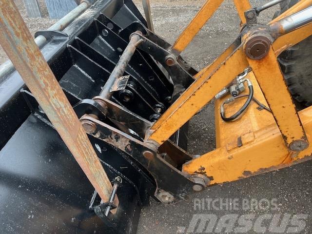 CASE 695SR HYD SKIFT FOR OG BAG, NY SKOVL Traktorgravere