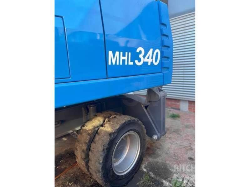 Fuchs MHL340 Gravemaskiner for avfallshåndtering